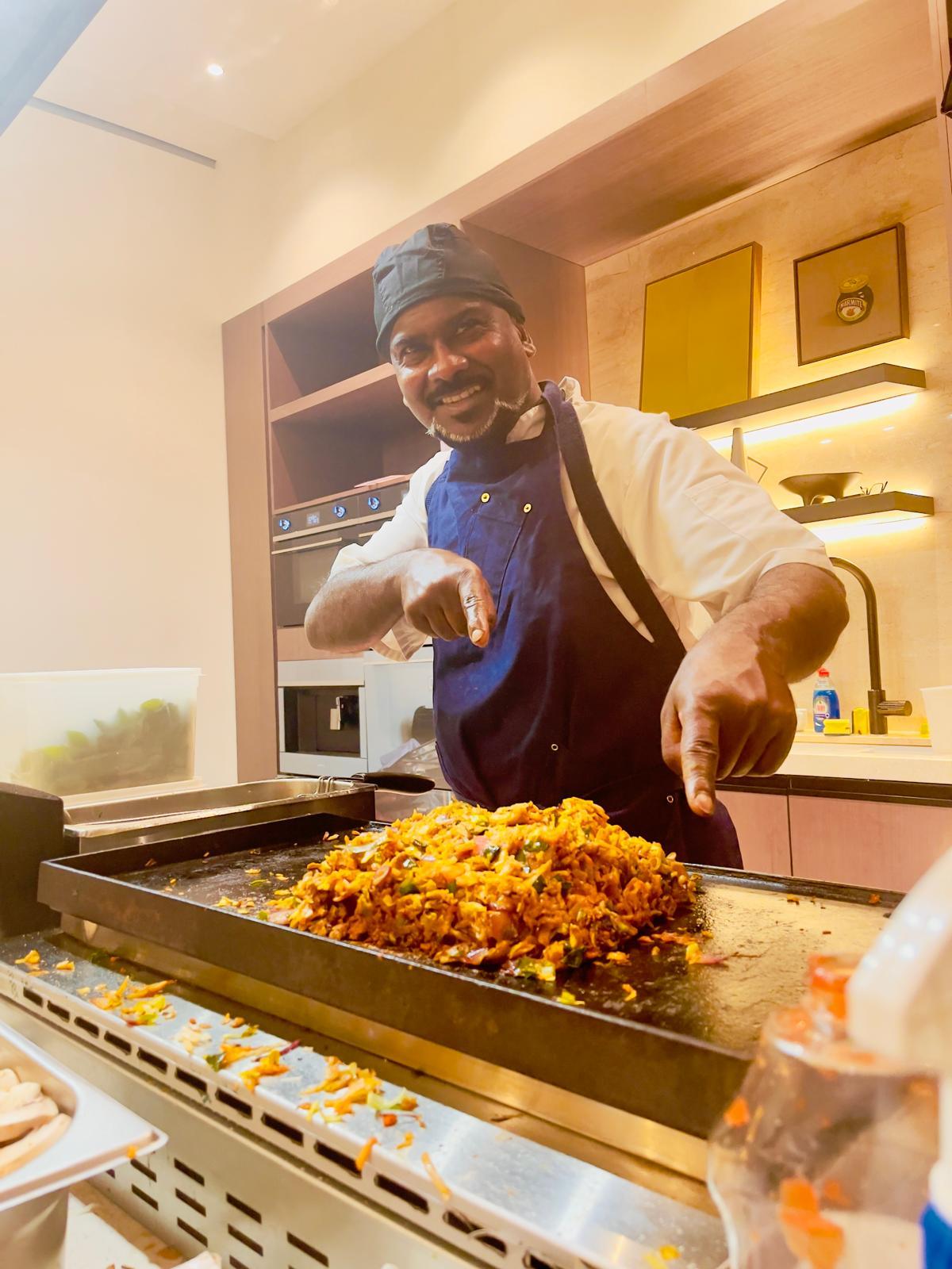 Yogi cooking in his kitchen